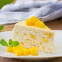 Mango Crepe Cake / 芒果千层糕 · Mille Crepe with stuffed and topped with fresh mango.