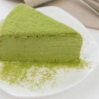 Matcha Crepe Cake / 抹茶千层糕 · Matcha Flavored Mille Crepe Cake topped with matcha powder.