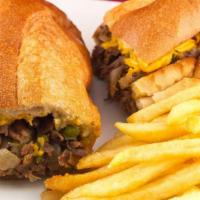 Classic Philly Cheesesteak · served with fries