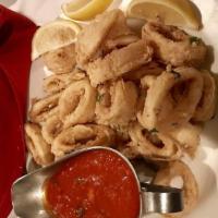 Fried Calamari · Tender calamari lightly battered and fried to perfection.