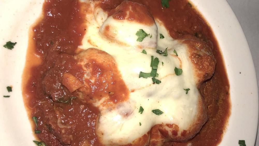 Stuffed Mushroom · Mushrooms stuffed with sausage and homemade oreganata breadcrumbs, topped with mozzarella then baked in a marinara sauce.
