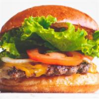 Cheeseburger · Beef, Lettuce, Tomato, Onion, American Cheese, OG Sauce