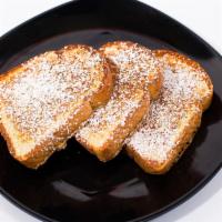 Brioche French Toast Breakfast · Three thick slices of bakery fresh, brioche dipped in our house recipe, grilled to perfectio...
