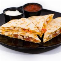 Chicken Quesadilla · Grilled chicken, tomatoes, and cheddar jack cheese. Served with a side of sour cream.
