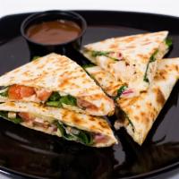 Spinach & Chicken Quesadilla · Grilled chicken, garlic herb Mayo, baby spinach, tomato, red onion, and Swiss cheese. Served...
