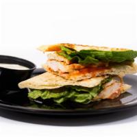 Buffalo Chicken Panini · Choose popcorn chicken or grilled chicken, buffalo sauce, lettuce, tomato, pepper jack, and ...
