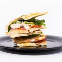 Spinach & Chicken Panini · Grilled chicken, garlic herb Mayo, baby spinach, tomato, red onion, Swiss, and side of balsa...