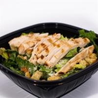 Chicken Caesar Salad · Caesar salad with our marinated grilled chicken breast, parmesan cheese, and croutons. Serve...
