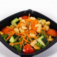 House Salad · Tomatoes, cucumbers, carrots and croutons. Served on a bed of freshly chopped romaine with a...