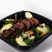 Steak Salad · Baby spinach, marinated steak, crumbled bleu cheese, dried cranberries, green apple slices, ...