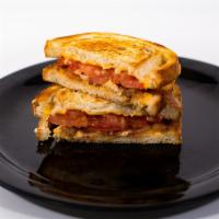 Grilled Cheese · Served with American cheese on bakery fresh sourdough.