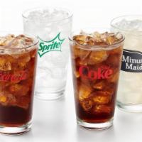 Coke® Fountain Drinks · Satisfy your taste buds with our line-up of cold fountain drinks. 30 oz.