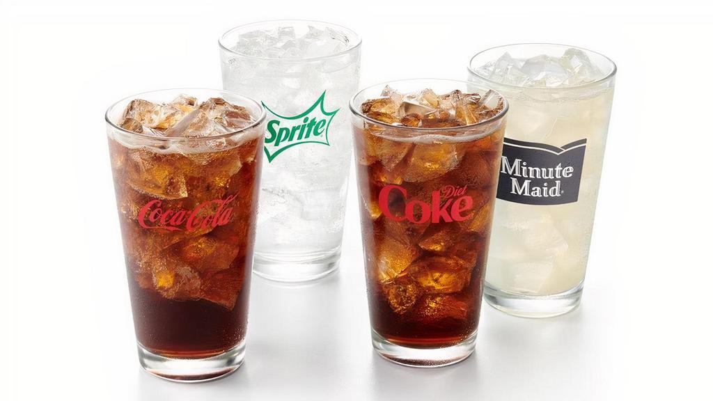 Coke® Fountain Drinks · Satisfy your taste buds with our line-up of cold fountain drinks. 30 oz.