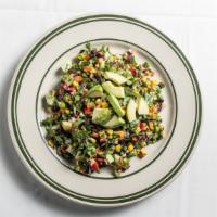 Rocco Salad Chopped · Spinach, romaine, peas, corn, carrots, cucumber, hearts of palm, avocado, red & green bell p...