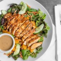 Thai Chicken Salad · Warm Thai spiced chicken breast over mixed greens with Mandarin oranges, cucumbers, carrots,...