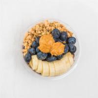 Pb Power · Topped with peanut butter, banana, granola, blueberries.