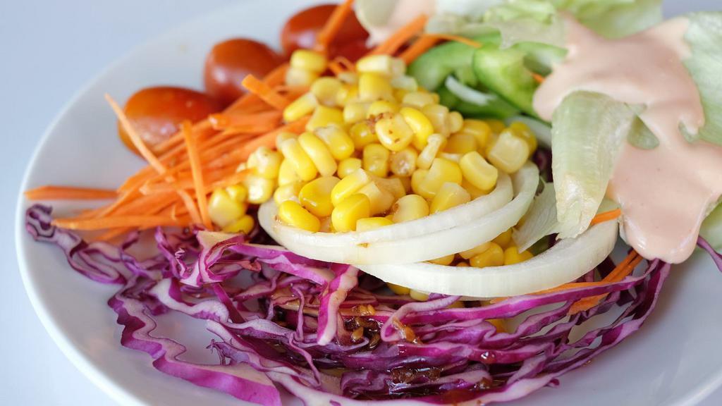 Create Your Own Salad · Create your own salad by choosing a base, hearty protein, unlimited fresh toppings, and flavorful dressing.