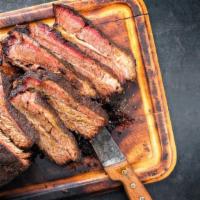 Brisket · Tender primal cut of meat and served with side dish of choice.
