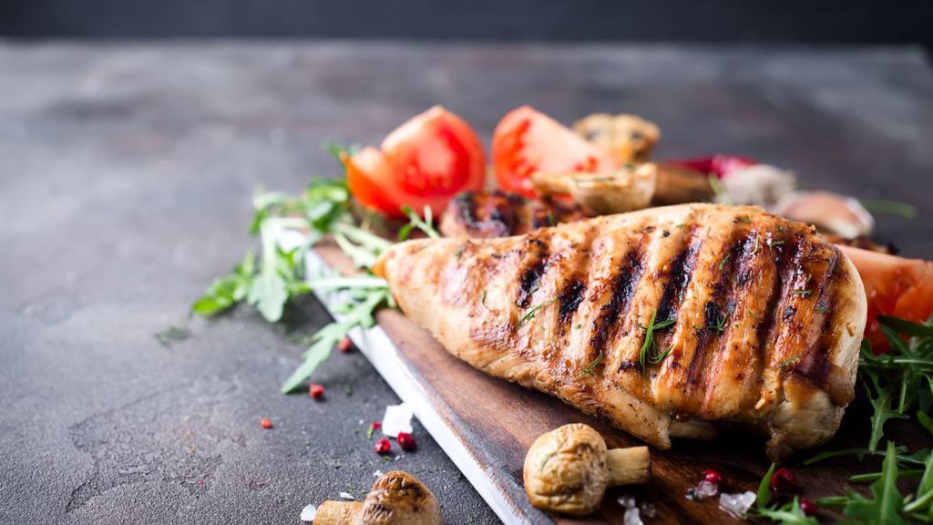 Grilled Chicken · Tender chicken seasoned and grilled to perfection and served with side dish of choice.