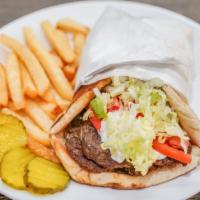Beef Gyro · with lettuce, tomato, onion & tzatziki sauce wrapped in a pita.