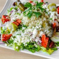 Greek Rice Bowl · a nest of our classic Greek salad topped with a large scoop of our homemade rice pilaf. *GF*...