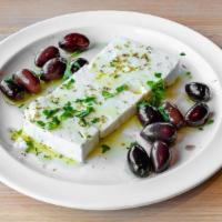 Feta And Olives · Thick Sliced Feta cheese served with black kalamata olives and a drizzle of olive oil. *GF* ...