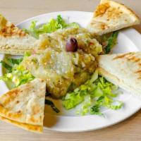 Melitzano Salata · eggplant smoked with garlic, blended with fresh herbs and olive oil served with pita bread. ...