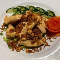 Chicken Strips  · Sweet Chili Sauce, Lime Wedge, Thai Basil, Topped with Fried Garlic and Shallots.