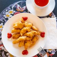 Sweet & Sour Chicken · With white rice,