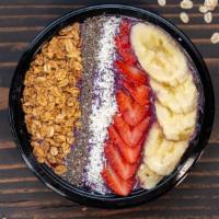 The Amazing Açaí Bowl · 530 cal mixed berries & açaí blended with yogurt & topped with banana, coconut, cacao nibs, ...