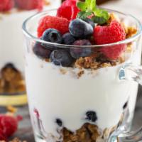 Berry Yogurt Parfait · Delicious yogurt parfait topped with fresh blueberry, raspberry, strawberry, and granola.
