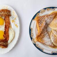 Jay Star Breakfast · Five silver dollar pancakes, two pieces of French toast, two eggs any style, two bacon and t...