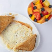 Healthy Breakfast · Two egg whites, sliced turkey whole wheat toast and a fruit salad.