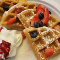 Berry Waffle · With fresh strawberries blueberries and whipped cream.