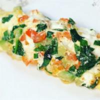 Greek Omelette · Spinach, tomato and feta cheese.