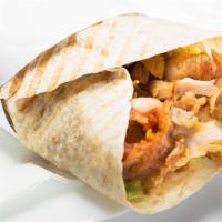 Lamb Gyro On Pita · Fresh thinly sliced lamb gyro meat topped with chef's special white and red sauce, and mixed...