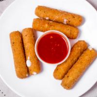 Mozzarella Sticks · Most popular. Six pieces served with sauce.