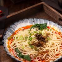 Dan Dan Noodles · Vegan. Contains scallion, spinach and hot sauce. Spicy.