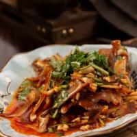 Pig Ears With Special Sauce · Contains fresh garlic, cilantro, peanuts. Spicy.