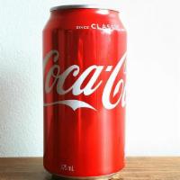 Coke · Cocola (can).