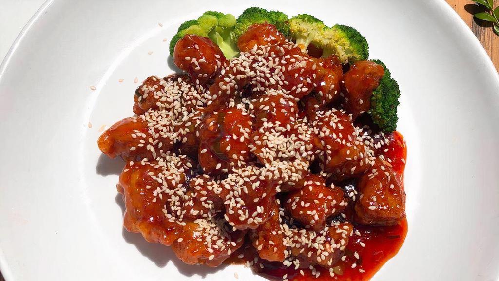 Sesame Chicken · Deep fried chunk white meat and a few steamed broccoli, sesame seed w. Sweet sour sauce.