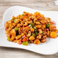 Chicken With Cashew Nuts · Sauteed diced white meat and diced red pepper, water chestnuts, cashew nuts w. Brown sauce.