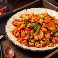 Stir Fried Chicken With Roasted Chili Peanuts · Sauteed diced white meat and diced spicy green pepper, red pepper, water chestnuts, peanuts ...