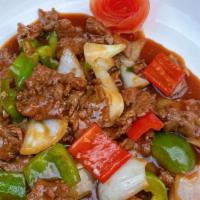 Pepper Steak · Sauteed sliced beef w. Green red peppers w. Brown sauce.