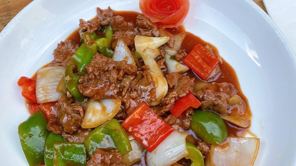 Pepper Steak · Sauteed sliced beef w. Green red peppers w. Brown sauce.