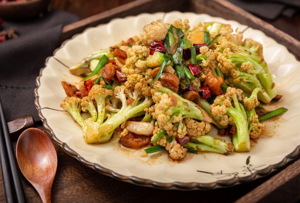 Sauteed Cauliflower With Dried Pork · Cauliflower with dried pork fat, chives and dry hot peppers. Spicy.