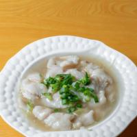 Sliced Fish With Ginger Scallion · Sliced fish and ginger scallion w. White sauce.