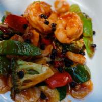 Jumbo Shrimp  Hunan Style · Sauteed prawns and broccoli, snow peas, green pepper, luffa, water chestnut w. Spicy black b...