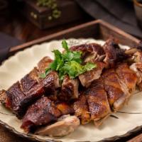 Smoked Tea Duck（烟熏鸭） · Half a duck. Hoisin sauce on the side. Every main dish comes with (1) white rice or (1) brow...