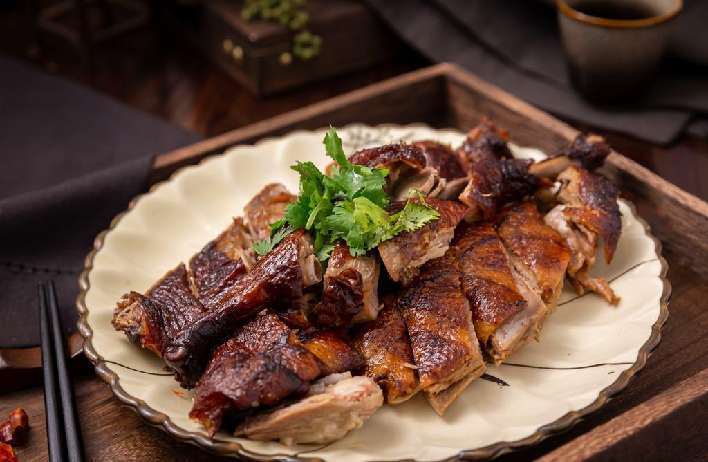Smoked Tea Duck（烟熏鸭） · Half a duck. Hoisin sauce on the side. Every main dish comes with (1) white rice or (1) brown rice.